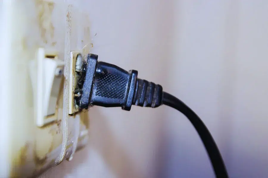 Types of Electrical Switches, Sockets, and Their Uses showing overheating risk of universal sockets under continuous load